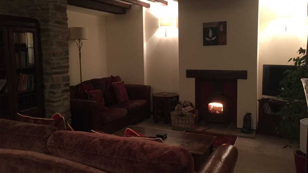 Cosy sitting room in Forest Mil Cottage warm up after a day in the Brecon Beacons