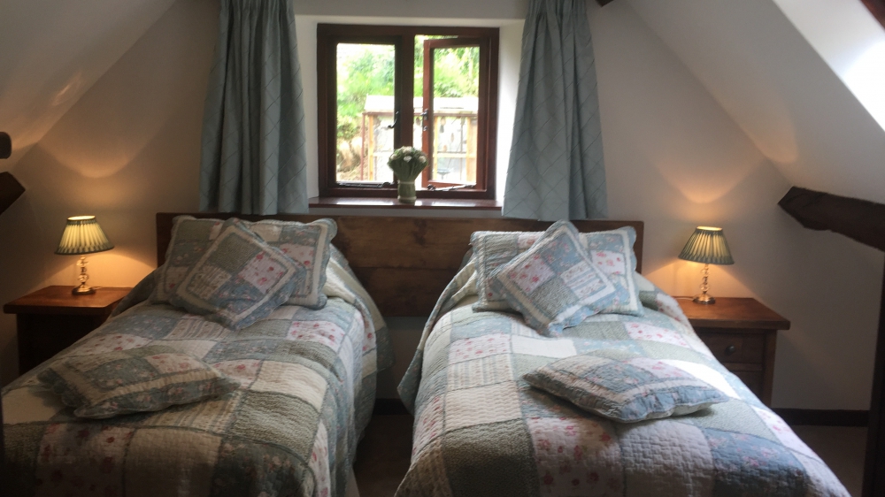 The Hobbit Room twin beds at Forest Mill Cottage